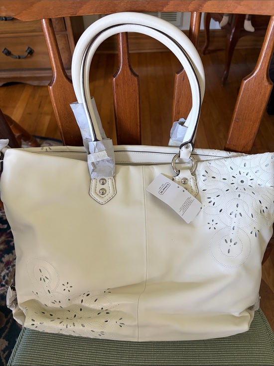 Coach Handbags - Coach White Laser-Cut Floral Tote